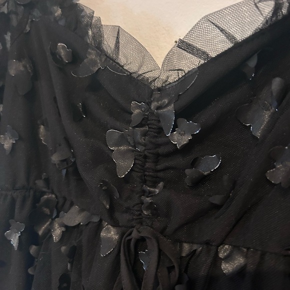 Chic Black Mini Dress with Butterfly Accents - Picture 3 of 6